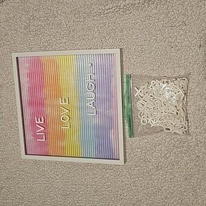Letter board sign with inuded letters and symbols